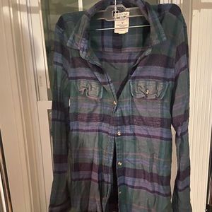 Button up plaid shirt.